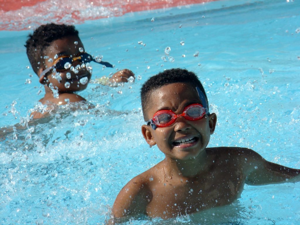 Kids having fun in the swimming pool